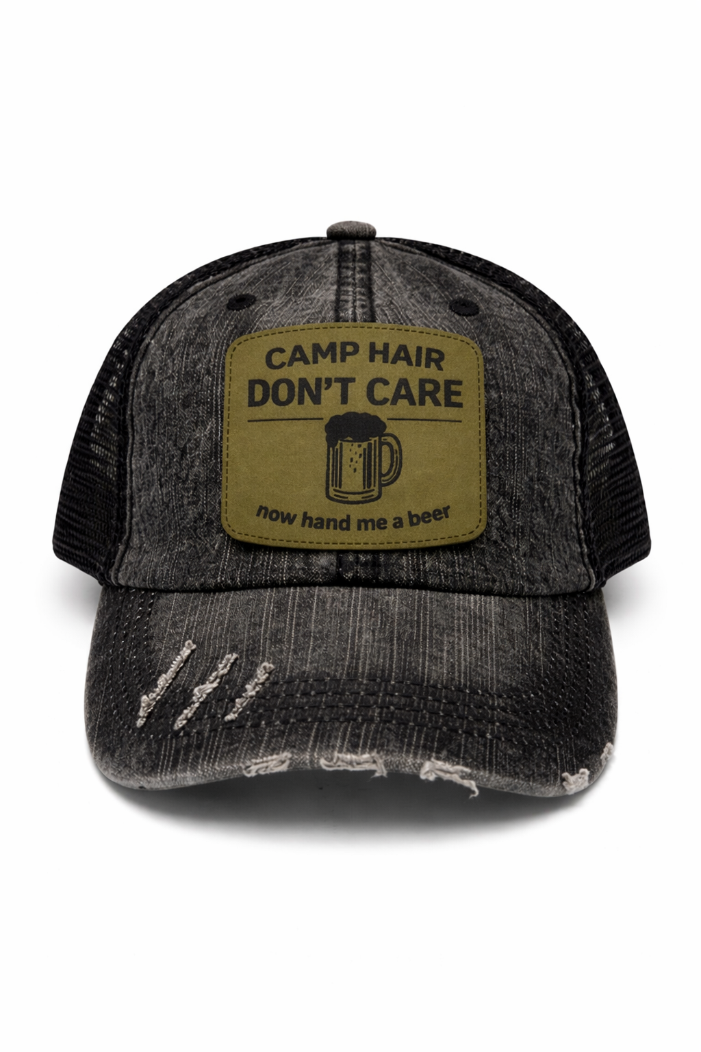 Black distressed trucker cap with a green patch and text on a white background