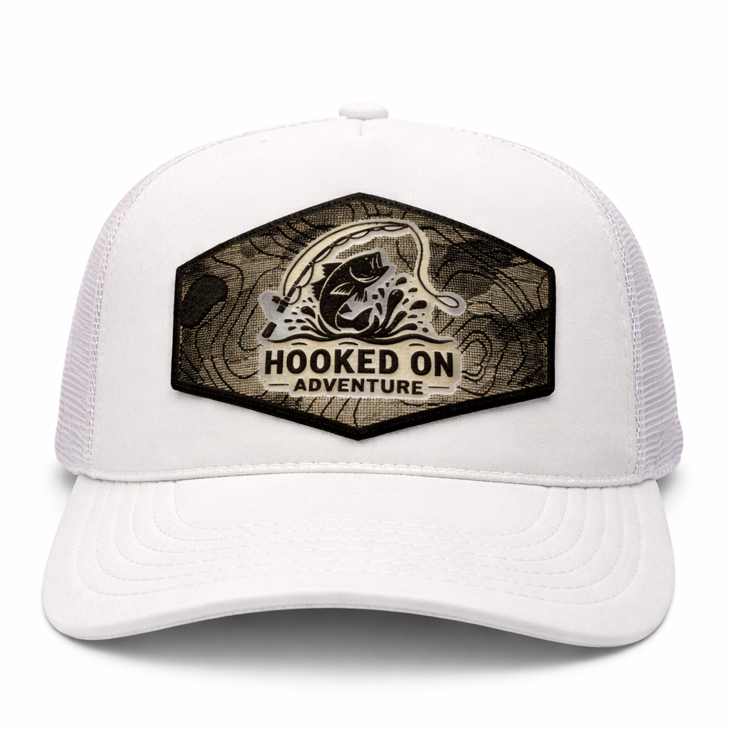 White trucker cap with 'Hooked on Adventure' logo on a white background