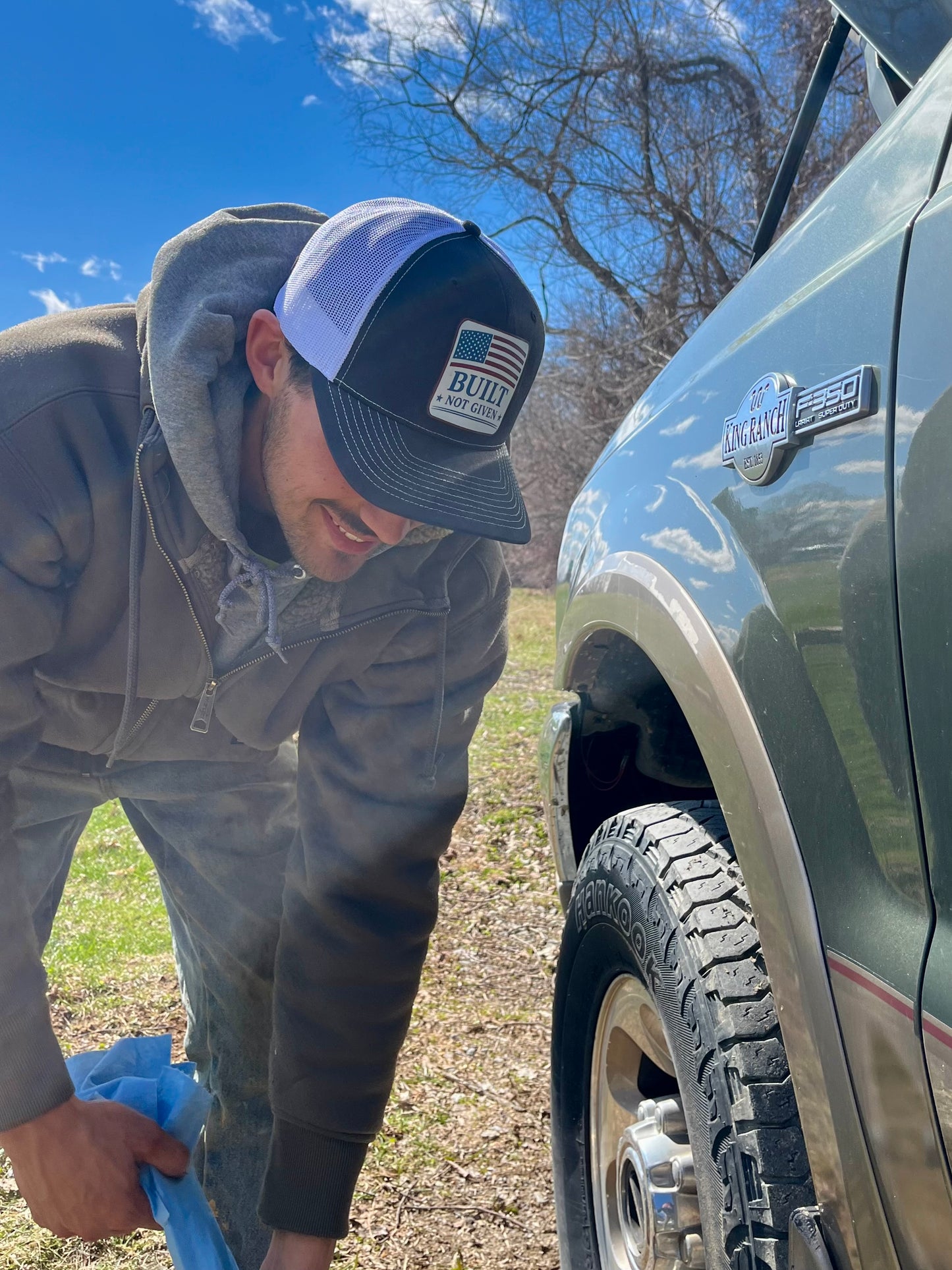 Built Not Given Premium Trucker Hat